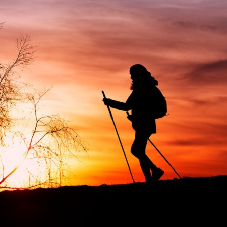 Silhouette of a pilgrim at sunset