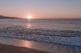 Tramonto su una spiaggia di Torre del Mar (Malaga, Andalusia)