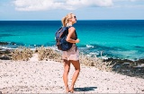 Young woman on a beach in Menorca, Balearic Islands