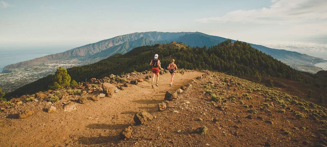 Runners along La Crestería in La Palma, Canary Islands