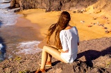 Turista sulla spiaggia del Papagayo, Lanzarote