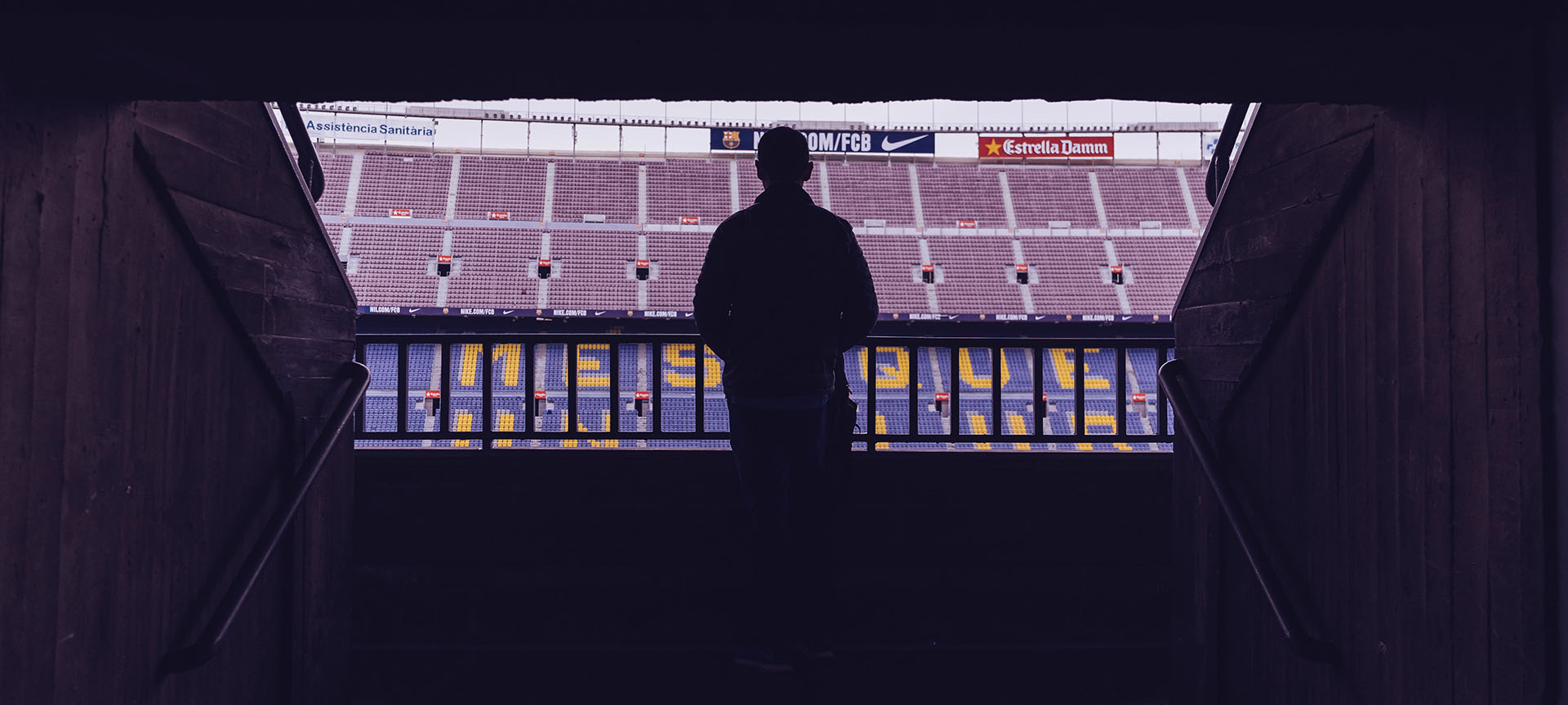 Fan entering the Camp Nou stadium in Barcelona Fan entering the Camp Nou stadium in Barcelona
