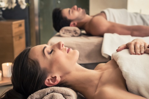 Couple relaxing during a spa treatment