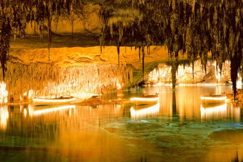 Boats on the lake inside the Drach Caves